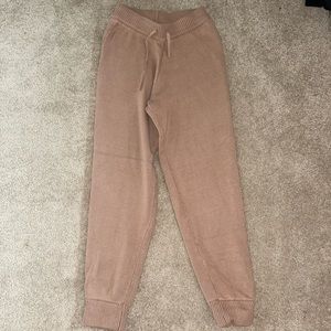 Women’s joggers, sweater material, size Medium, never worn